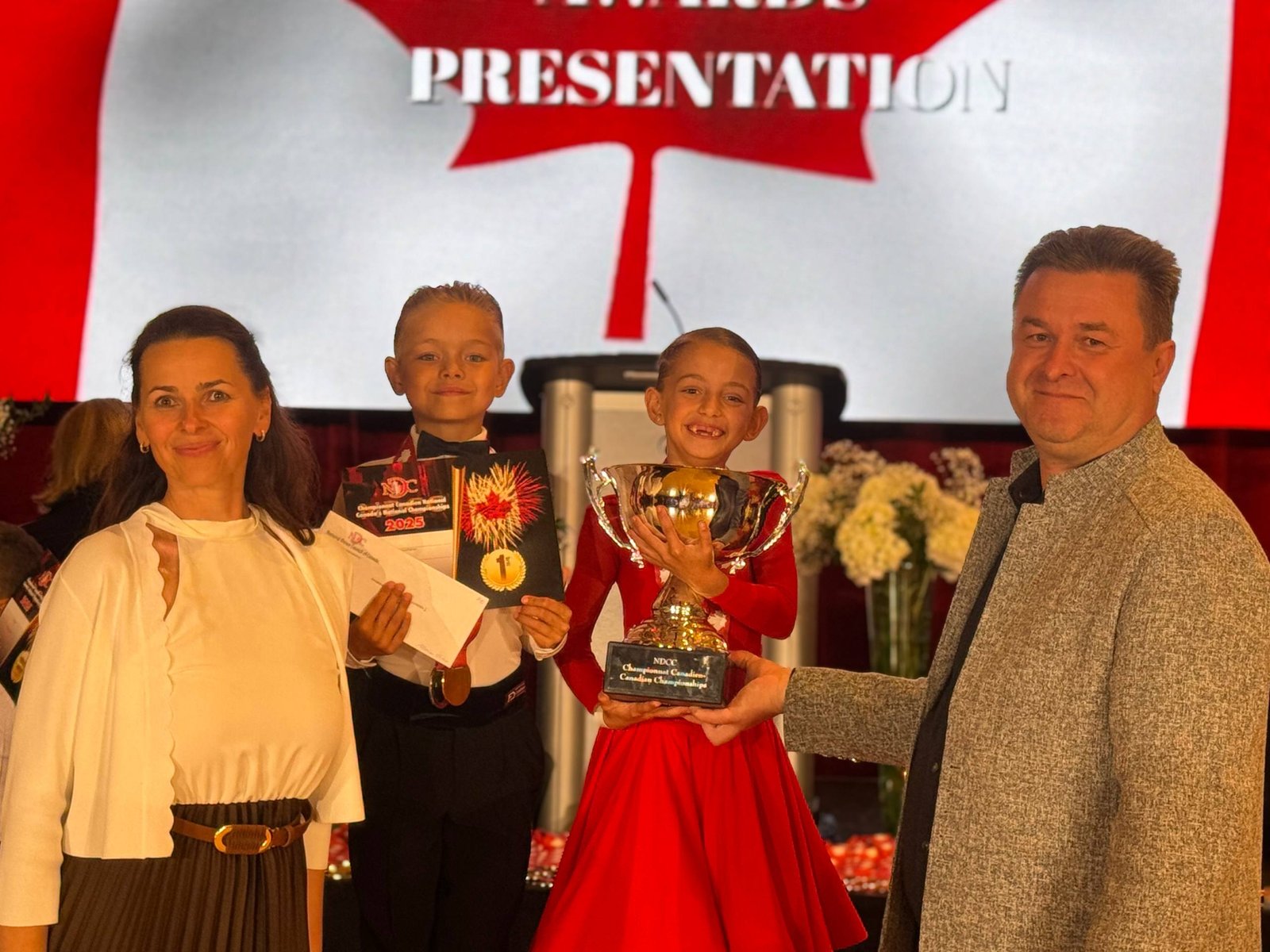 Universe DanceArt students with trophies